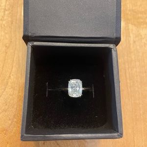 Cushion moissanite ring in 10k yellow gold